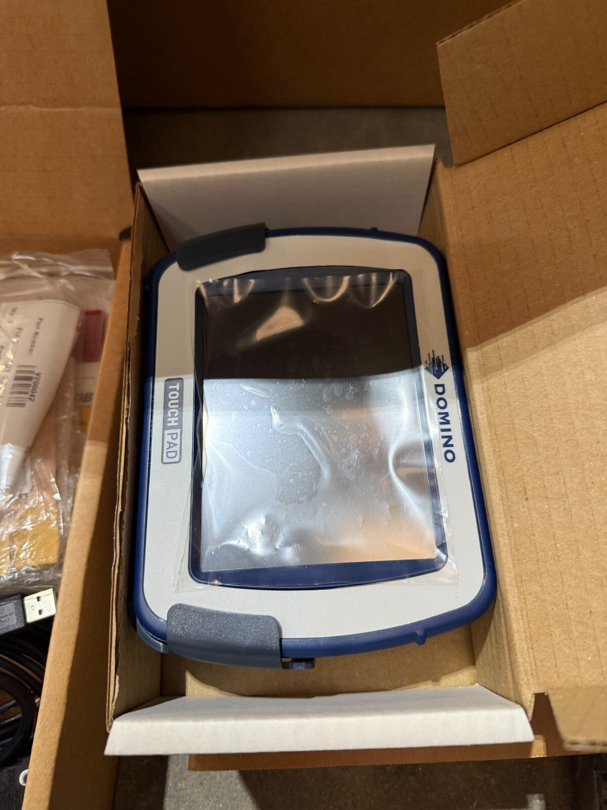 Domino V320i thermal transfer printer TTO