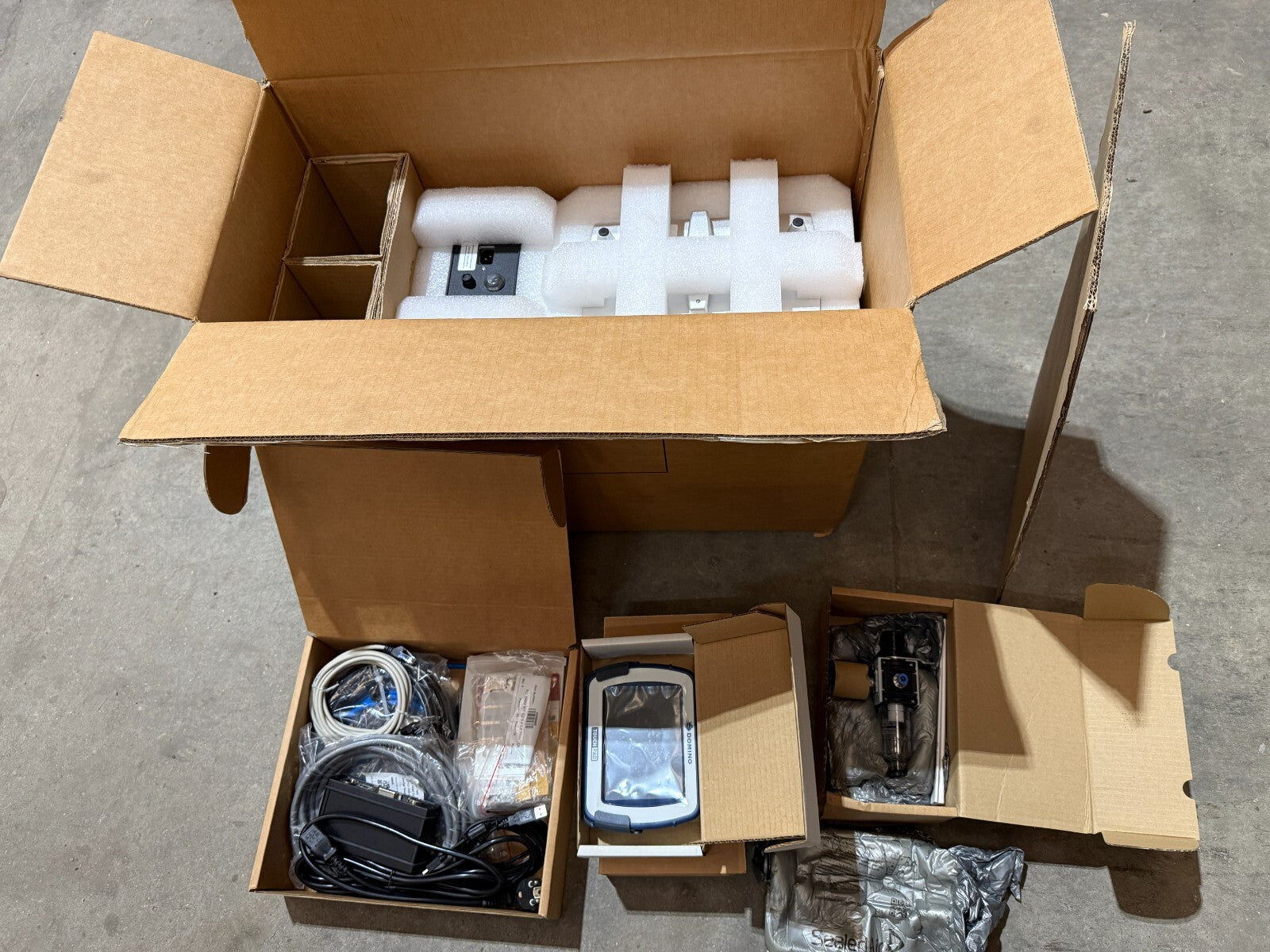 Domino V320i thermal transfer printer TTO