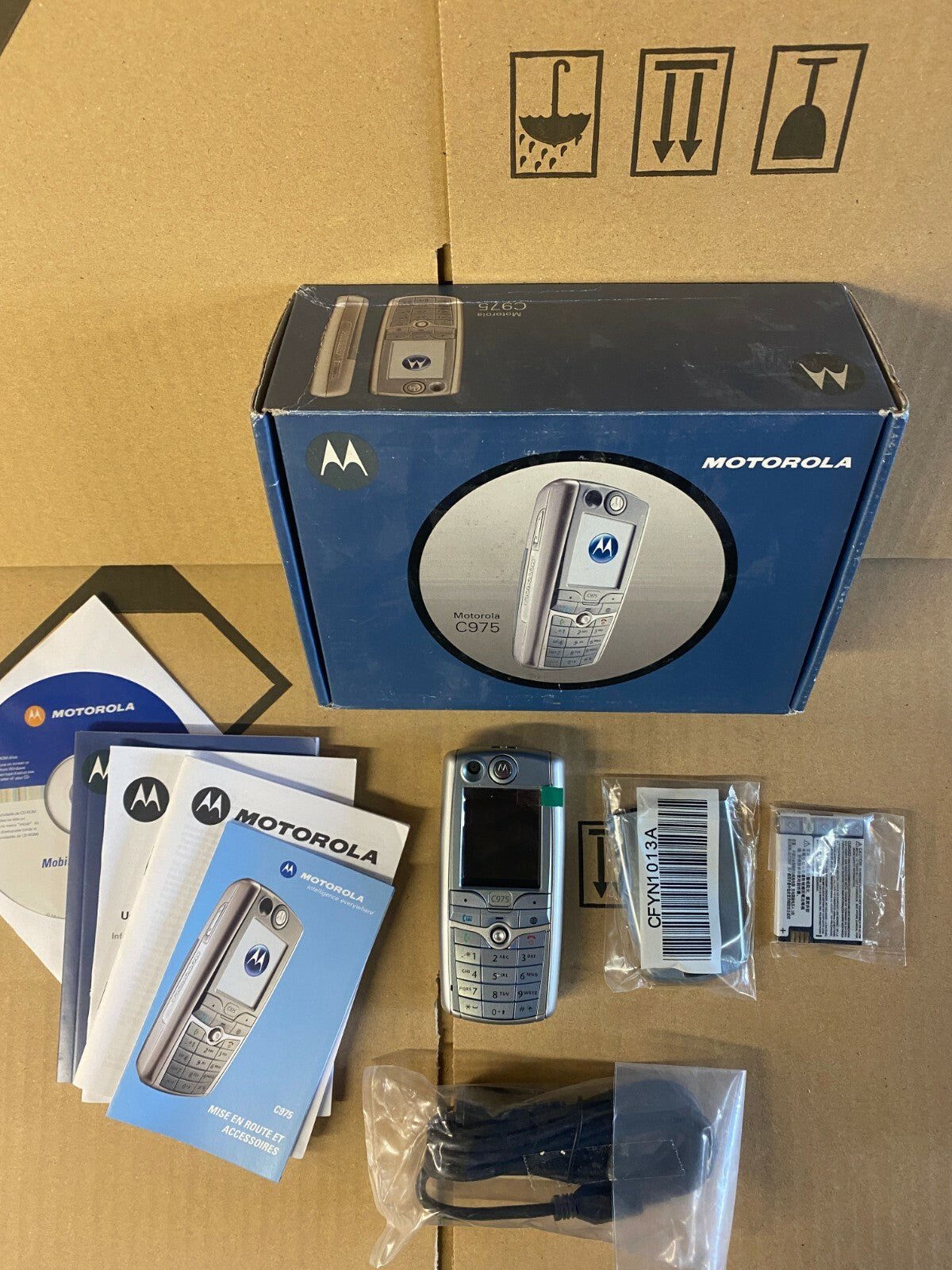 Motorola C975 manque écouteurs, batterie Hs - KLR Automation