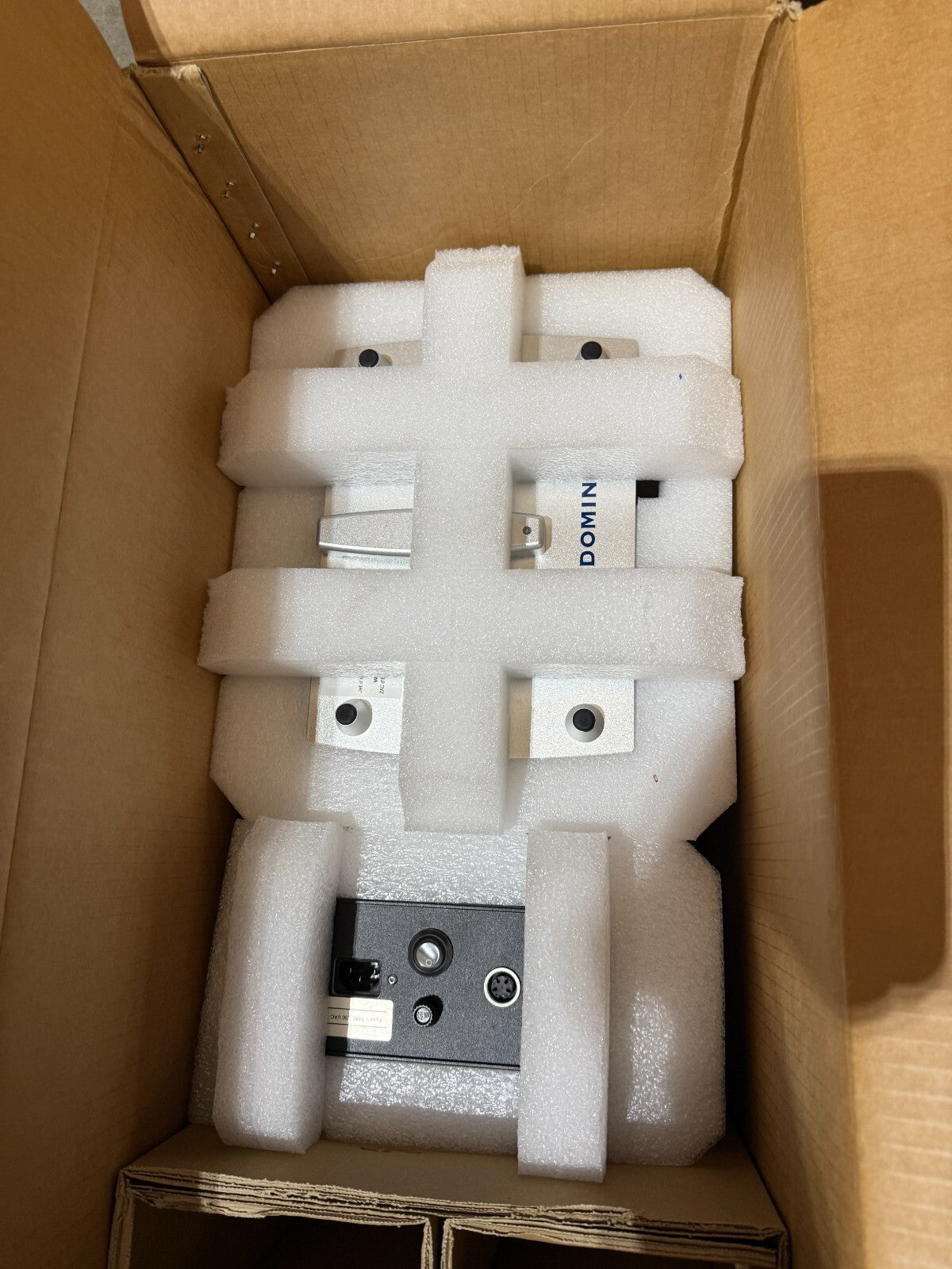 Domino V320i thermal transfer printer TTO